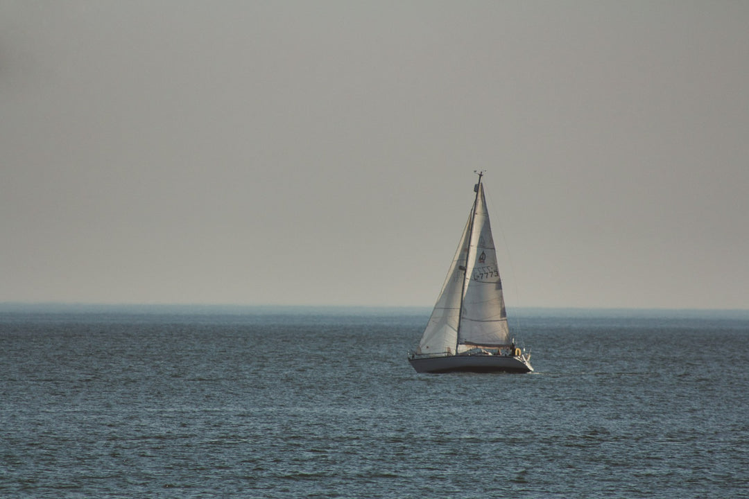 A small sailboat on a calm sea