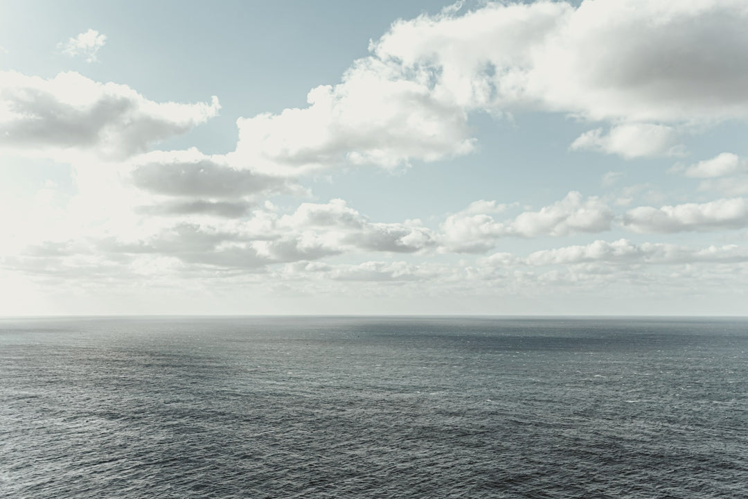 Sunlit clouds over the open ocean