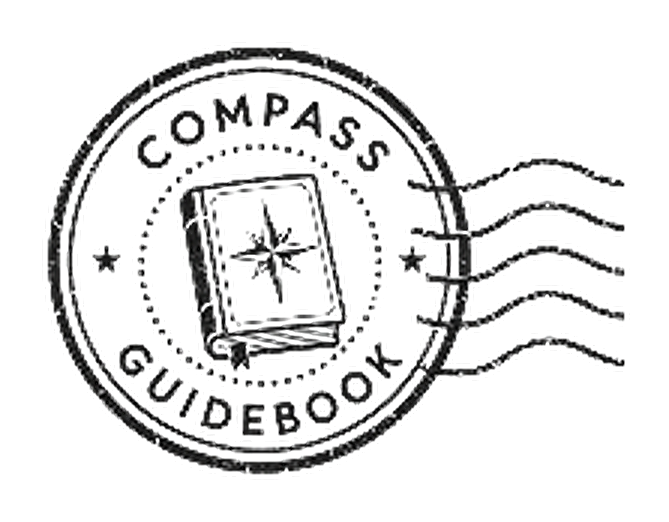 Postmark stamp reading Compass Guidebook with a small book and compass rose